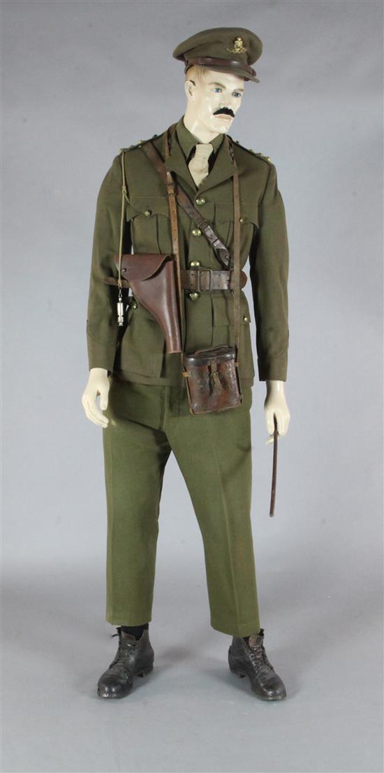 A WWI Royal Field Artillery officers dress uniform and accessories, on a mannequin,